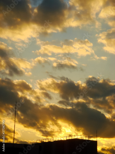 The sky and cloud of the evening to shine with gold