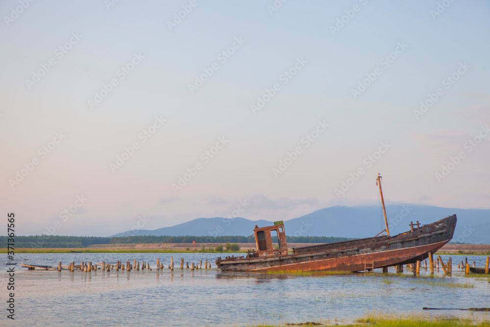 old fishing boat on the river