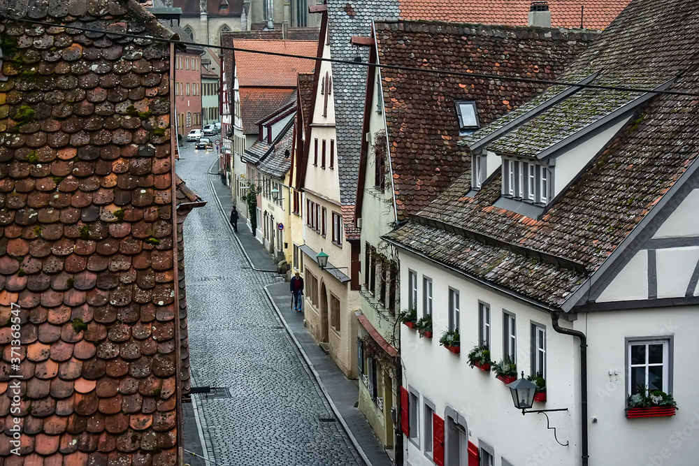 View from town wall of facades and roofs of medieval old town Rothenburg ob der Tauber, Bavaria, Germany. November 2014