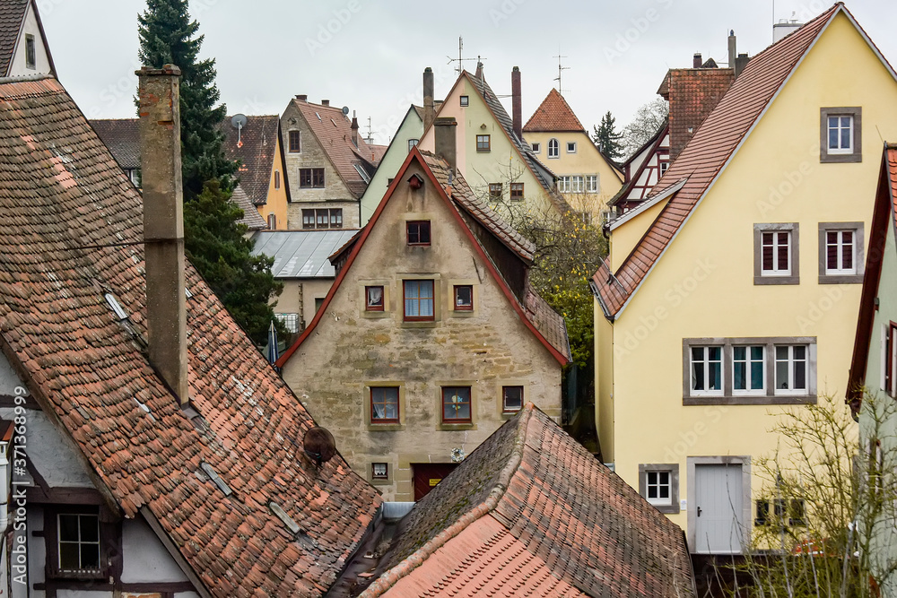 View from town wall of facades and roofs of medieval old town Rothenburg ob der Tauber, Bavaria, Germany. November 2014