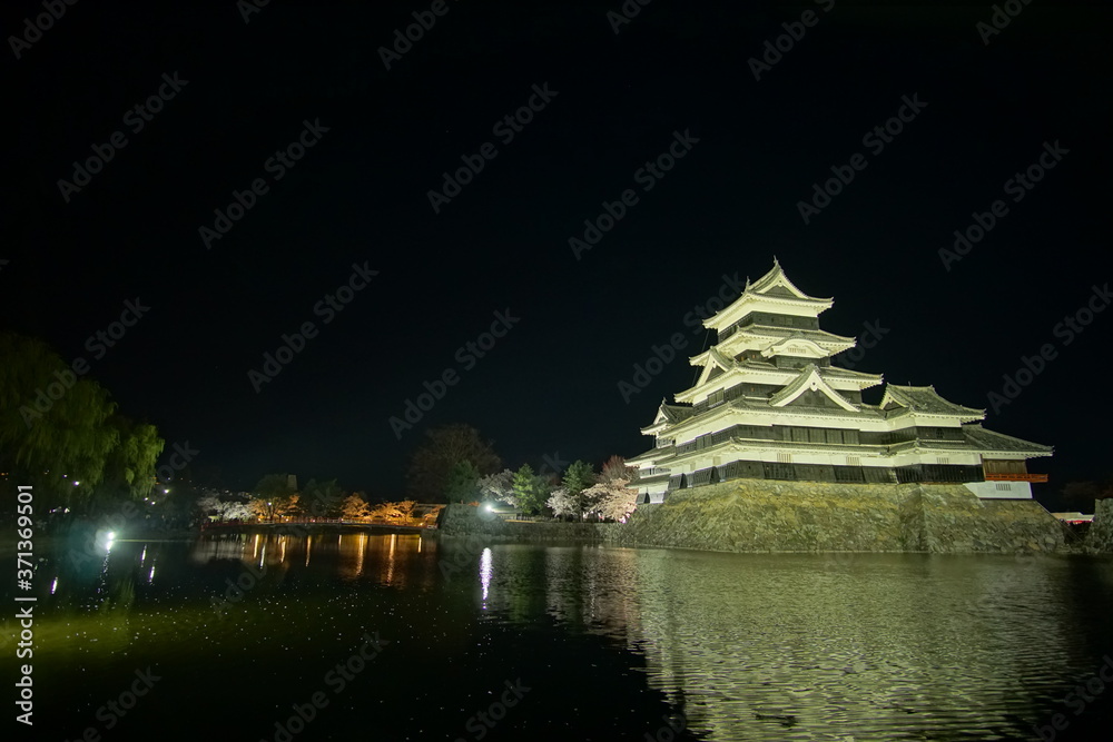 Japanese castle at night time in Matsumoto, Nagano, Japan.