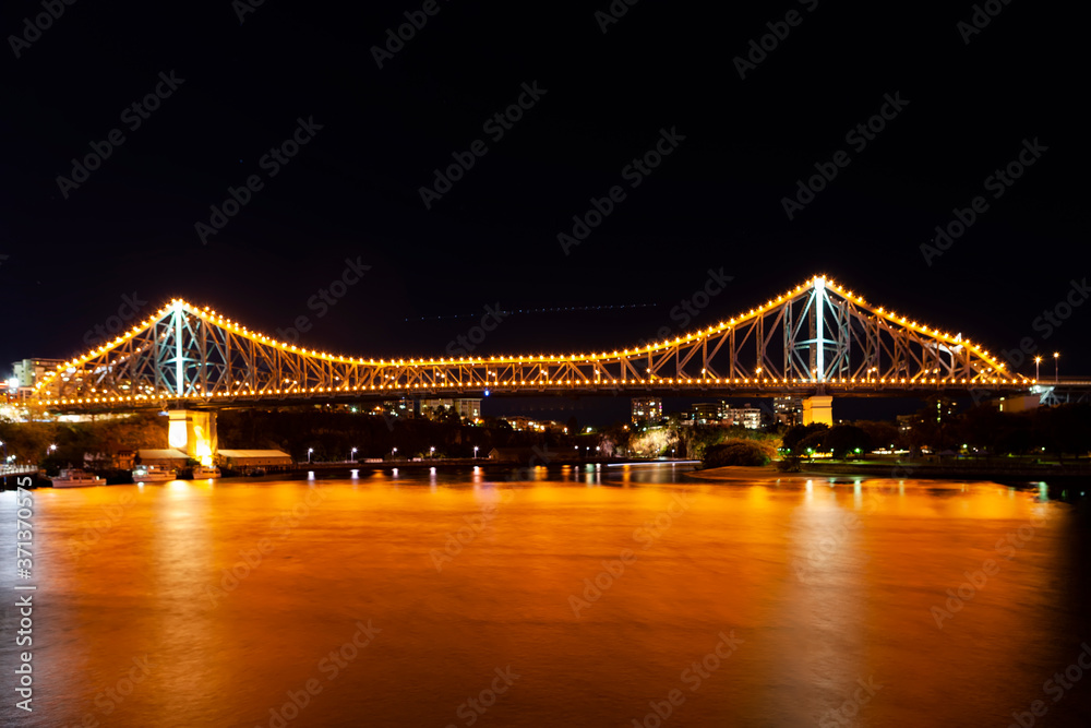 Illuminated Brisbane bridge at night