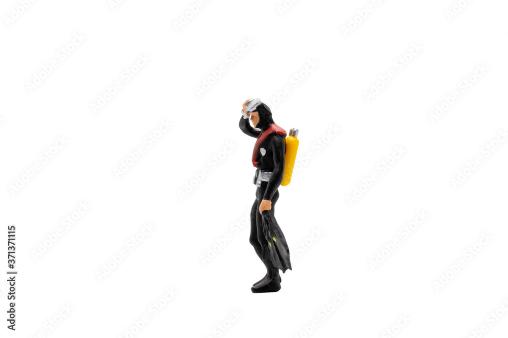 Miniature people : Scuba diver isolated on white background with clipping path Miniature people : Scuba diver isolated on white background with clipping path