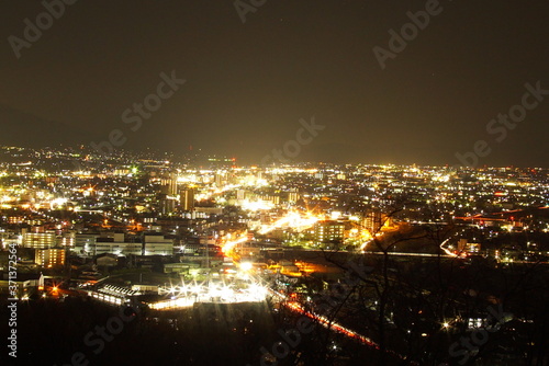 Aerial night panorama of the town called, SUWA in Nagano, Japan © Hirotsugu