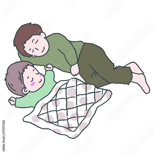 寝かしつけをするお父さん