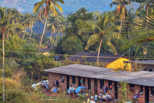 11/23/2019. Arambol. GOA. India. Houses of poor Indians in the Arambol in North Goa. Living like in slums. The concept of overpopulation and poverty photo