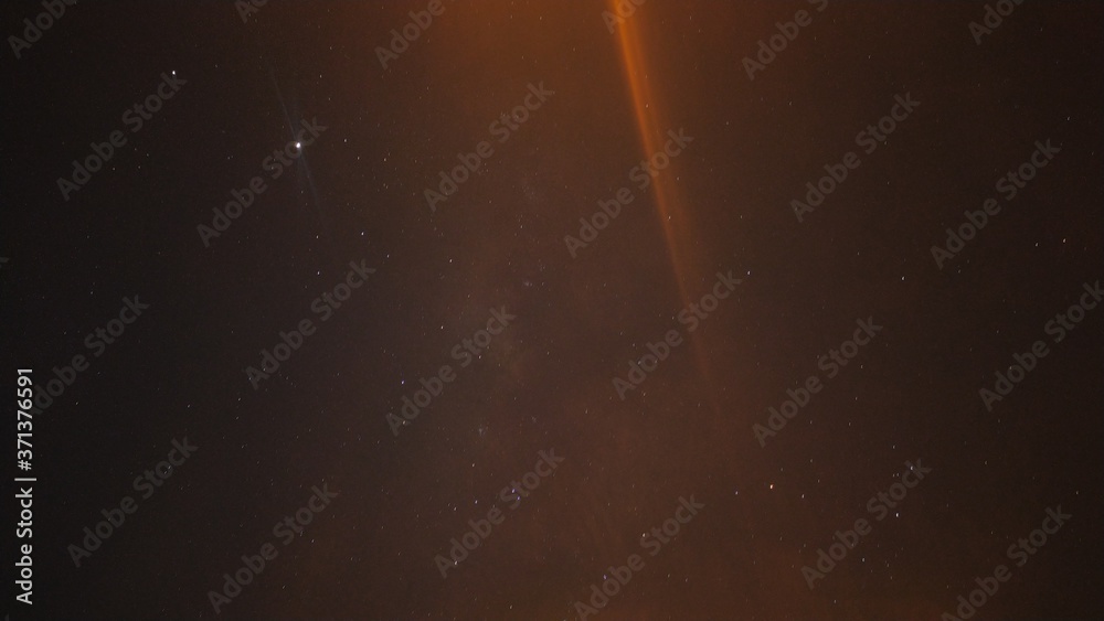 Fototapeta premium Milky way long exposure. The beauty of the Milky Way at night, looks faint and colorful.