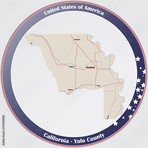 Round button with detailed map of Yolo County in California, USA.