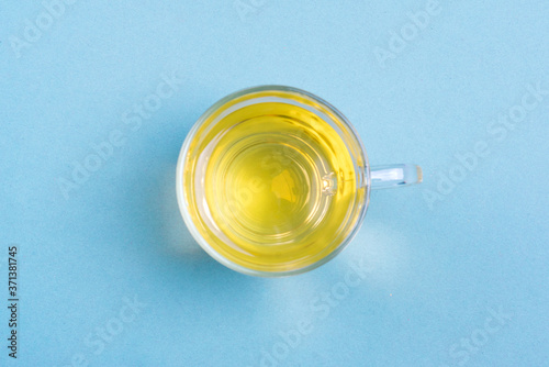 cup of tea on blue table Top view Flat lay Style life Beverages, lose weight concept