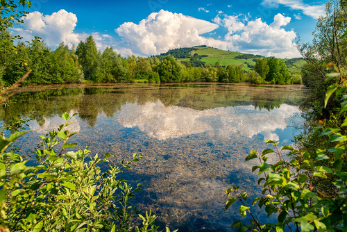 Reflection of clouds on water surface © Jaroslav Moravcik