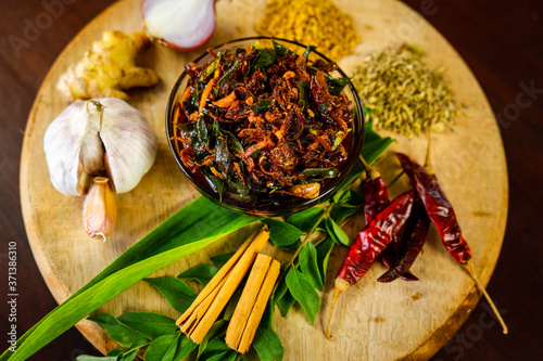 Spicy Maldives fish dish - (dried fish sambol/sambal) with leafy green water spinach (Kankun )stir fries. Asian food kitchen. photo