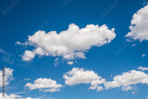 Images of a blue sky with white clouds