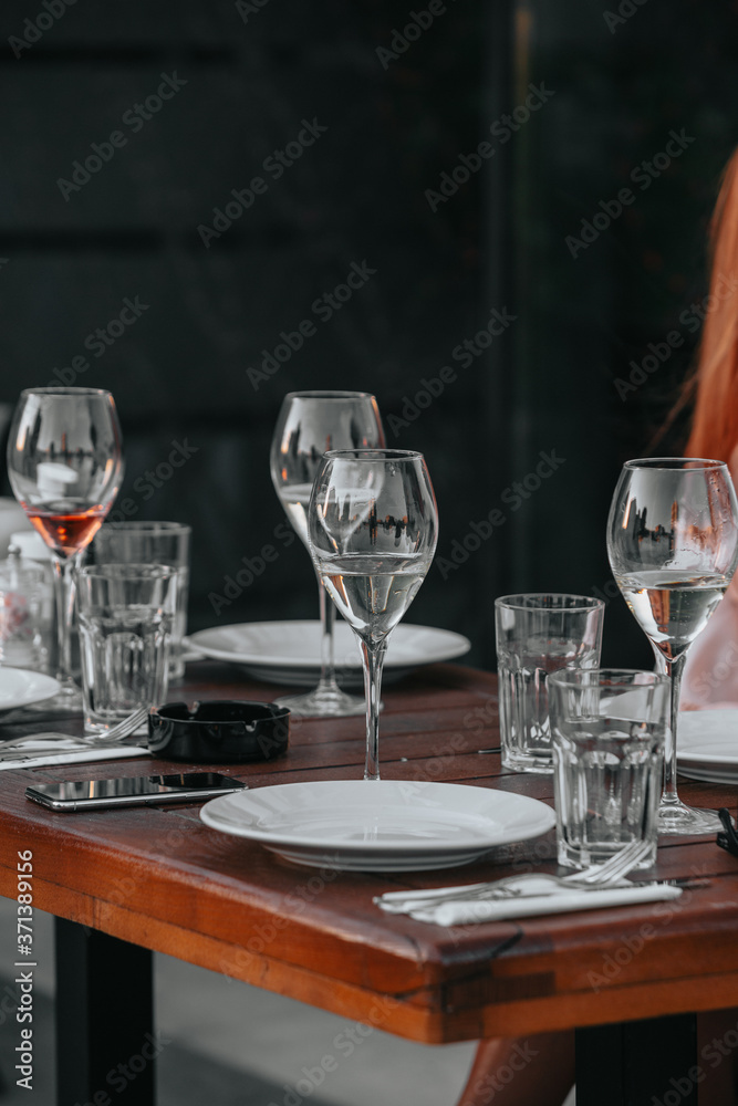 Glasses of white and pink sparkling wine on the table at the restaurant. Special wine tasting. Glasses of white and pink sparkling wine on the table at the restaurant. Special wine tasting.