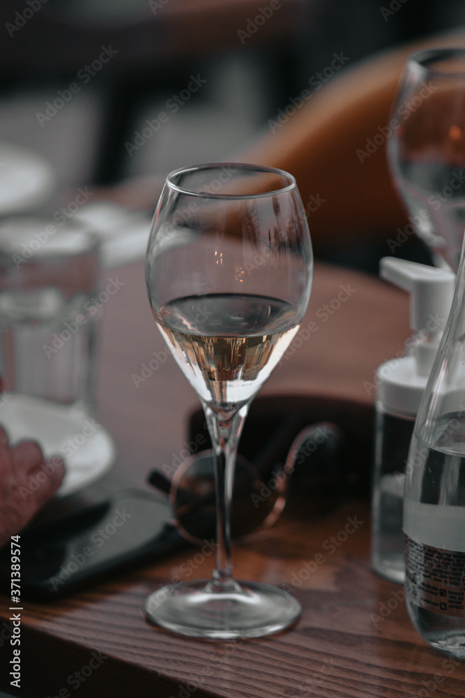 Glasses of white and pink sparkling wine on the table at the restaurant. Special wine tasting.