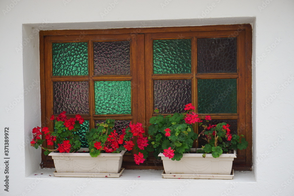 stained glass wooden window with flowers