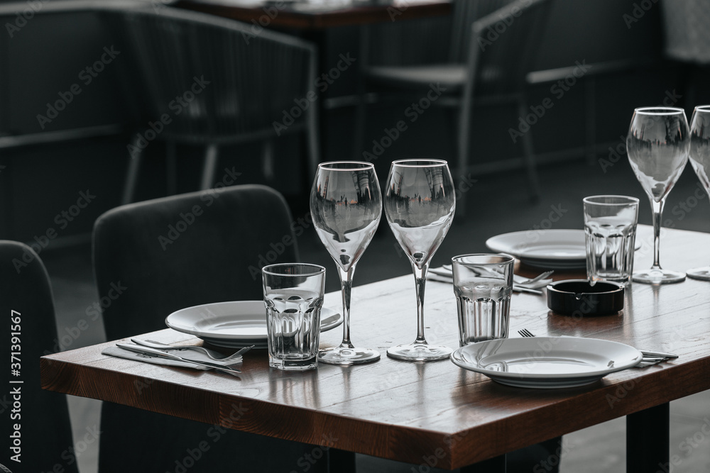 Glasses of white and pink sparkling wine on the table at the restaurant. Special wine tasting. Glasses of white and pink sparkling wine on the table at the restaurant. Special wine tasting.