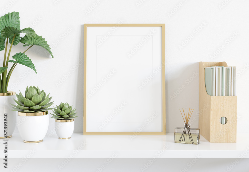 Fototapeta Złota rama oparta na białej półce we wnętrzu z roślinami i książkami makieta renderowania 3D