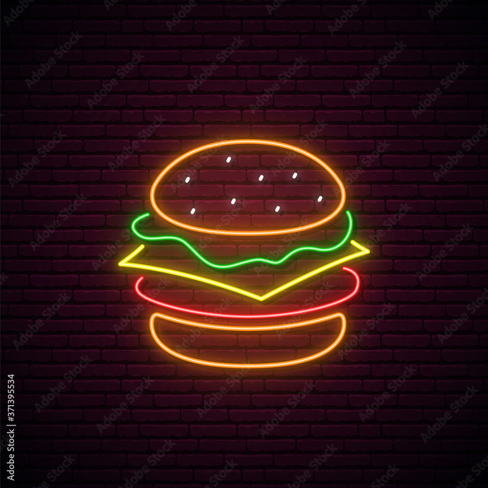 Neon burger sign. Glowing burger emblem isolated on dark brick wall