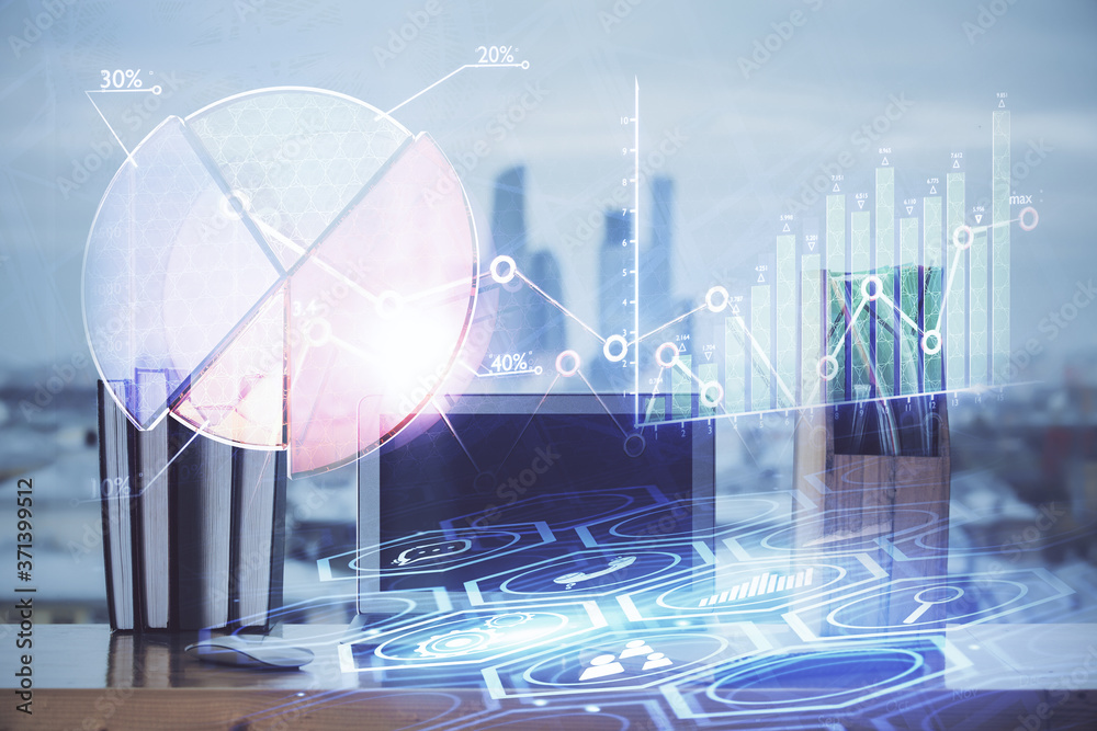 Forex market graph hologram and personal computer on background. Double exposure. Concept of investment. Forex market graph hologram and personal computer on background. Double exposure. Concept of investment.