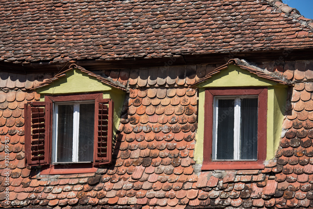 Details of red tiled roofs of medieval Brasov town in Transylvania, Romania. Europe