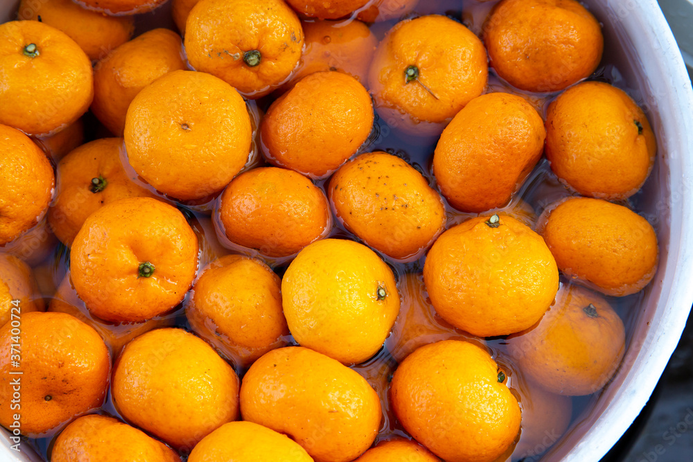 Organic fresh Mandarin oranges washed and prepared for party Organic fresh Mandarin oranges washed and prepared for party