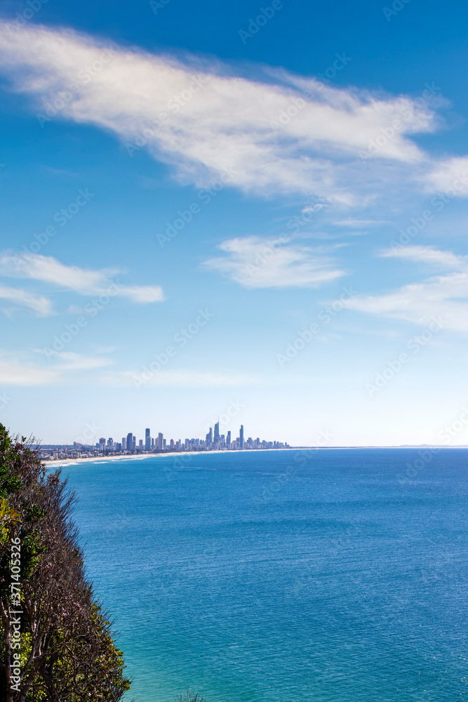 Scenic view of sea and big city against sky Scenic view of sea and big city against sky