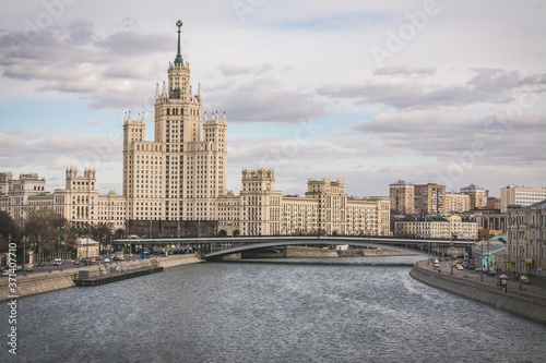 view from the bridge on the Moskva River against the background of the Stalinist skyscraper  classical architecture Moscow of the 20th century