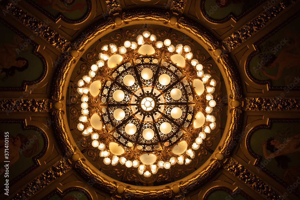 Closeup of chandelier in theatre