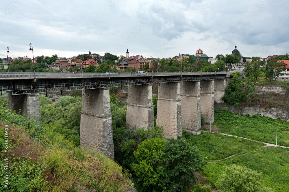 Old high stone bridge in Kamianets-Podilskyi, Ukraine