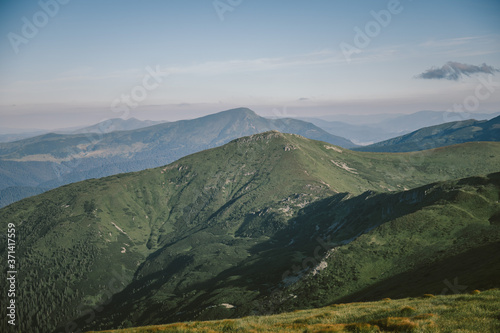 A view of a large mountain in the background