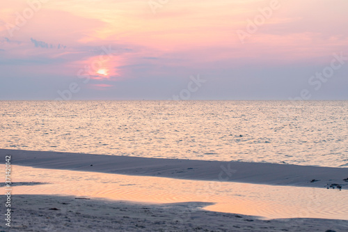 Fototapeta Naklejka Na Ścianę i Meble -  Beach, sunset over waves of Baltic Sea, Poland,