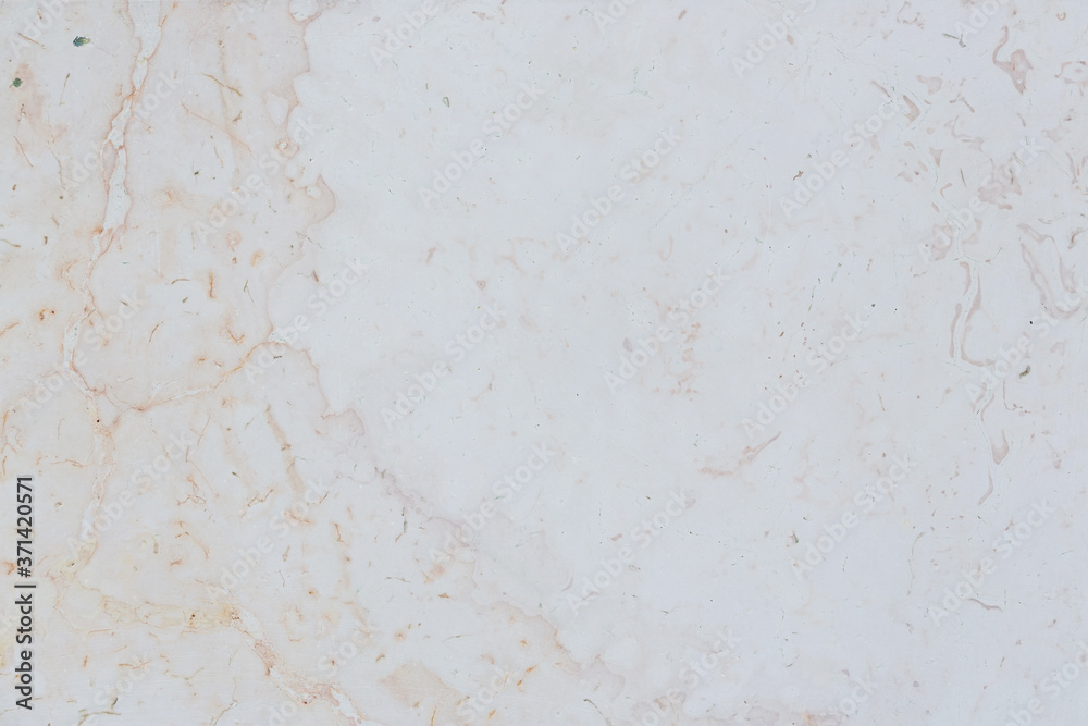 Dolomite texture. Natural rock with beautiful beige patterns on the surface. Polished flat stone. Classic luxury decoration building material. Solid stone background.