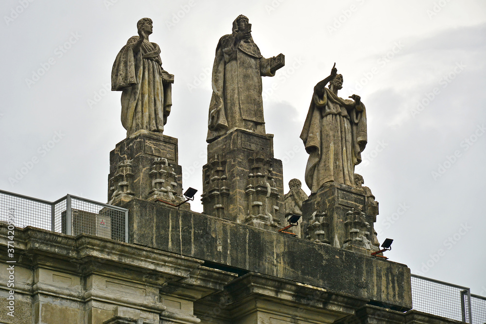 University of Santo Tomas main building facade church leaders statue