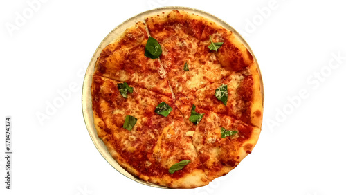 Red slice tomato sauce pizza with basil leaves