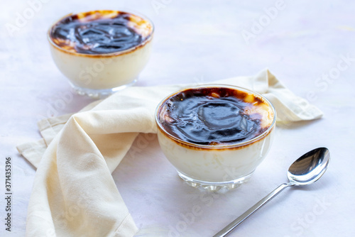 baked rice pudding on white wood - sutlac