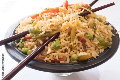 Chinese fried rice with vegetable. Prepared and served in a bowl 