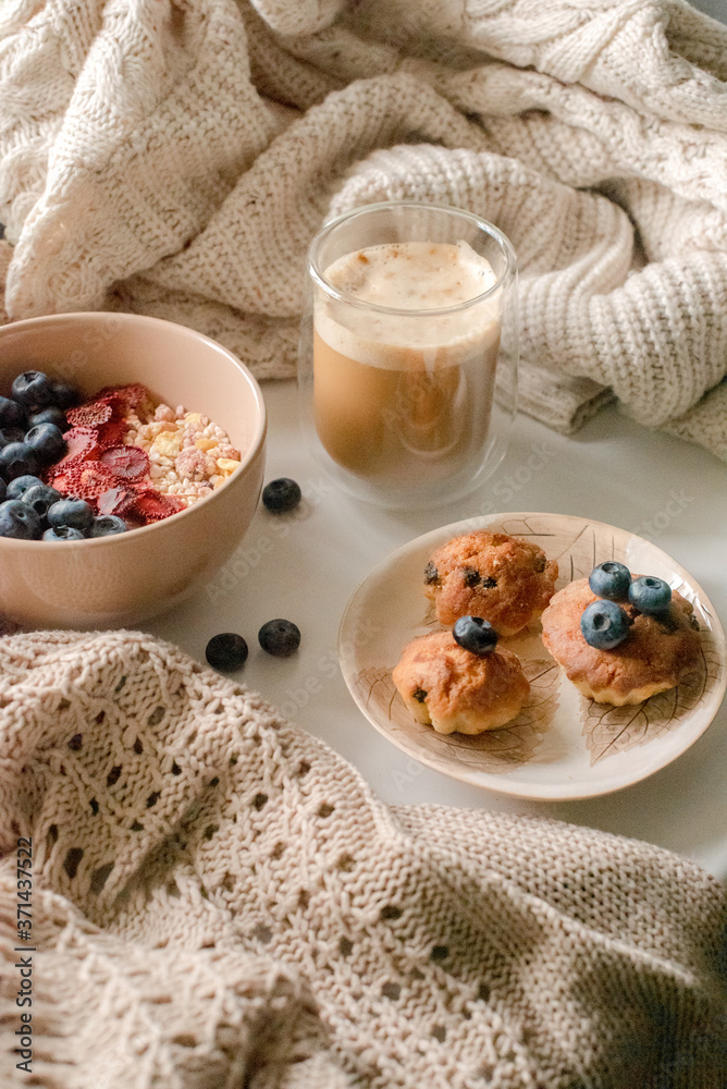 Breakfast with granola, coffee and cakes Breakfast with granola, coffee and cakes