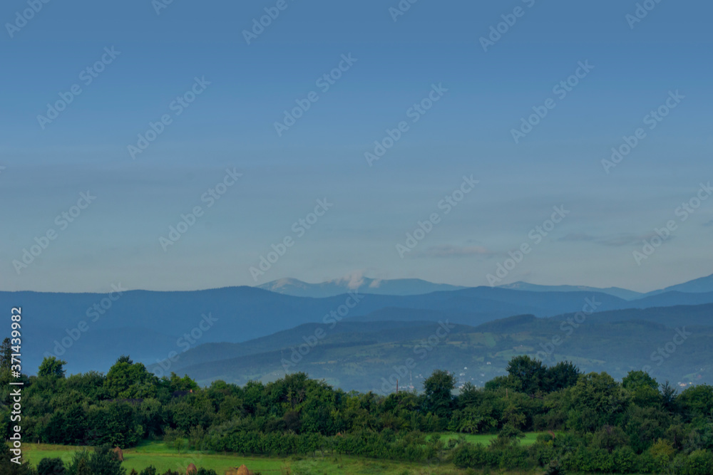 morning mountain landscape with blue sky