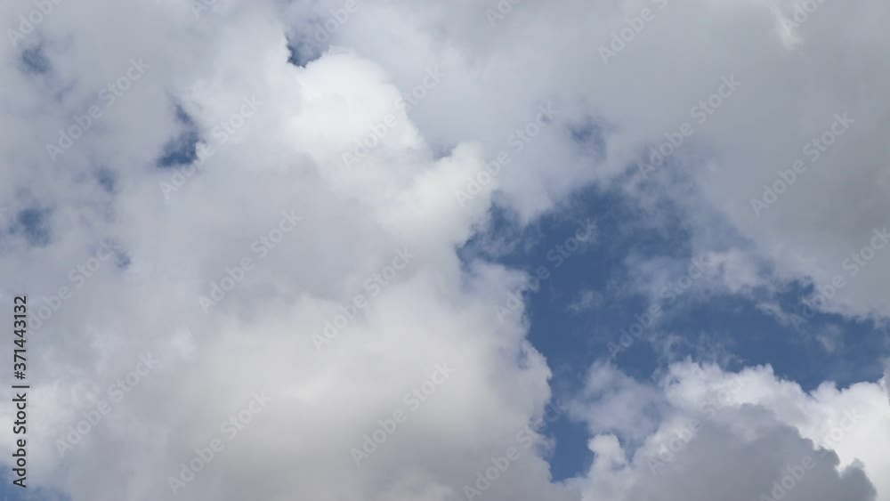 Time lapse, blue sky and white cloud backgrounds and textures closeup. Nature create very beautifully. Time lapse, blue sky and white cloud backgrounds and textures closeup. Nature create very beautifully.