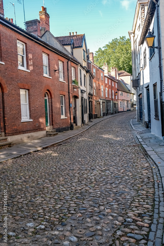 A view up the medieval cobblestone street of Elm Hill in the city of Norwich in the county of Norfolk