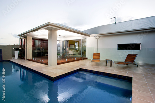 A large swimming pool at house backyard  © JRstock