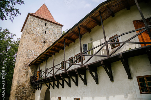 Medieval gothic castle Zvikov or Klingenberg on a rock above the confluence of the Vltava and Otava rivers, South Bohemia, Czech Republic photo