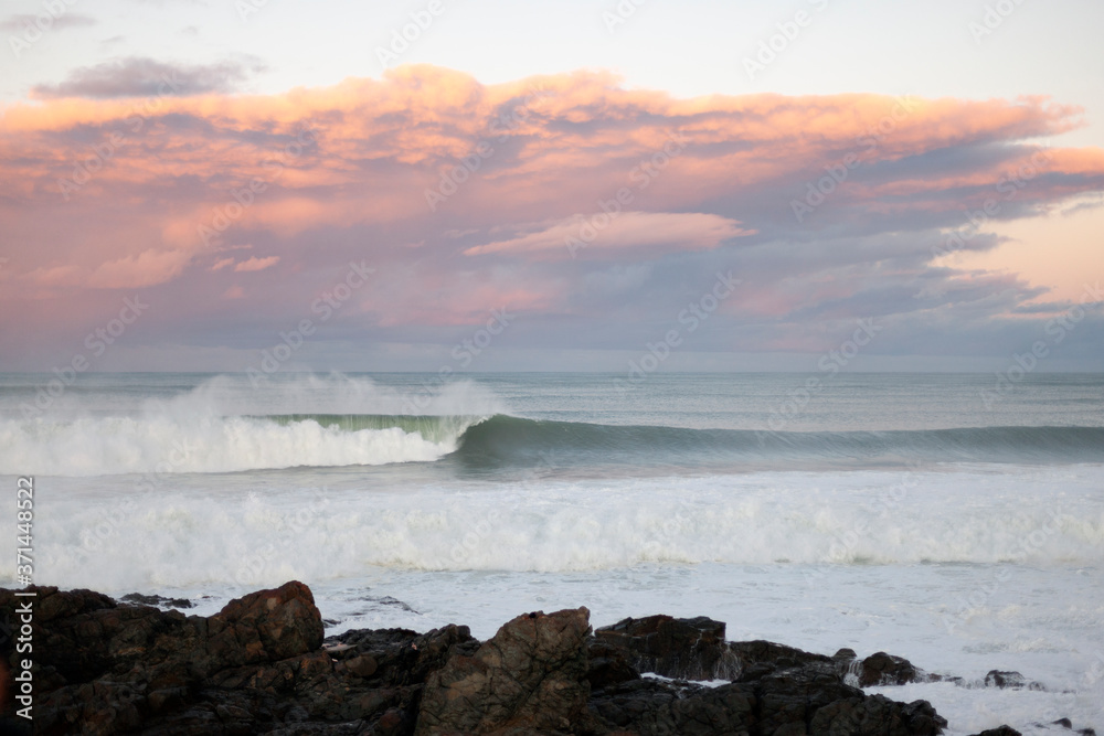 Powerful sea waves crushing to the rocks on the shore Powerful sea waves crushing to the rocks on the shore