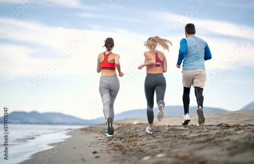 Group of people jogging together; Healthy lifestyle concept
