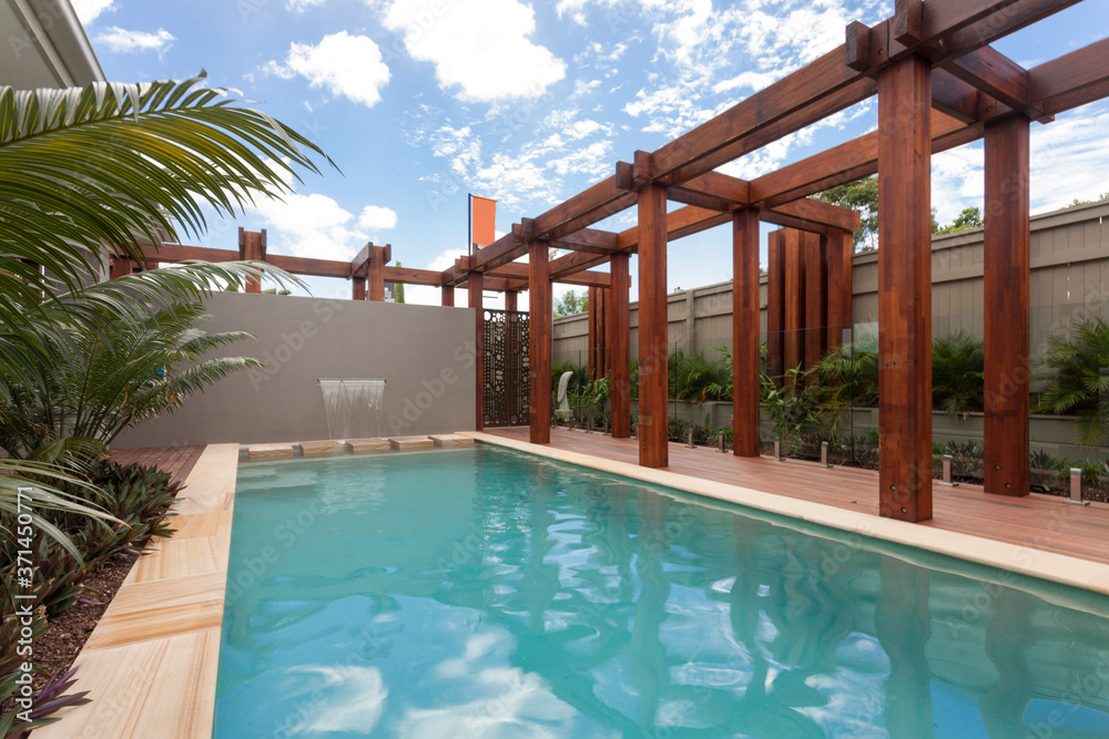 Fototapeta premium A large swimming pool in the backyard
