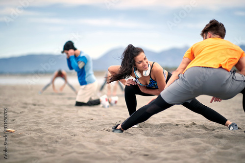 Group of people stretching together; Healthy lifestyle