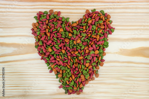 Heart-shaped pet food.  Dry food for pets