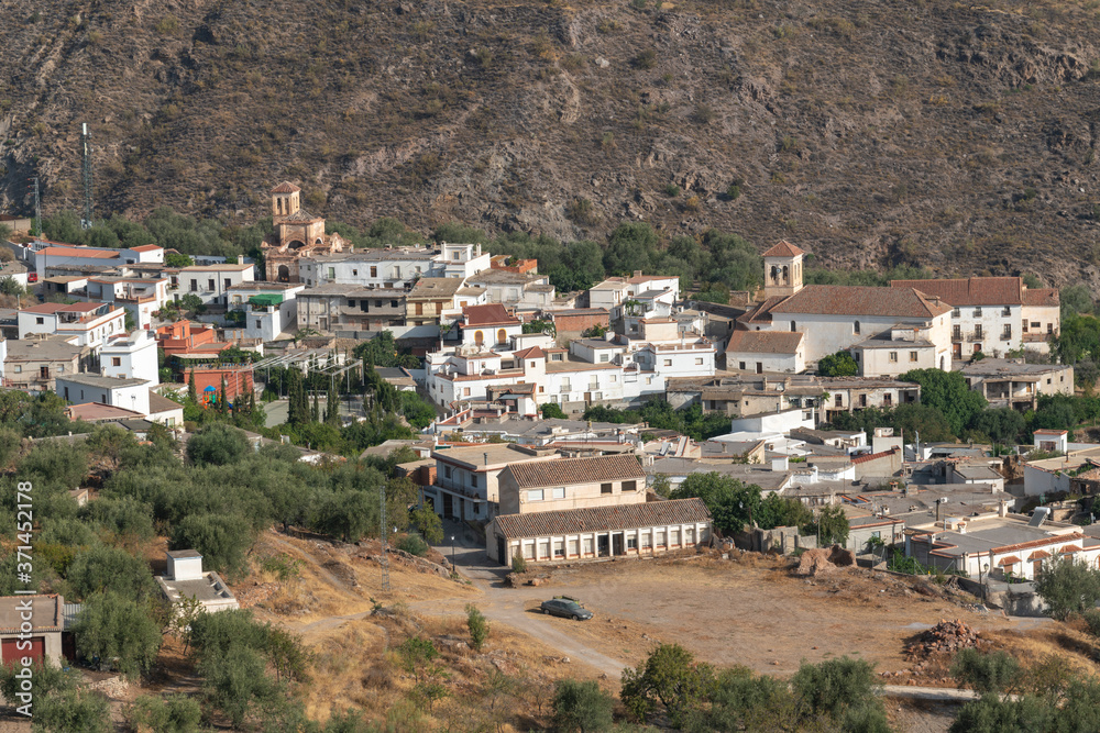 small town with white facades and church