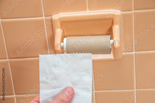 Last sheet of toilet paper in the bathroom