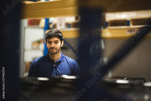 Male warehouse worker worki...